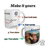 Two Camino Frances mugs with numbered arrows showing what you can personalise: trail stats, your own words, your dates.