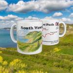 White mug with a watercolour map of the South West Coast Path, shown from two sides.