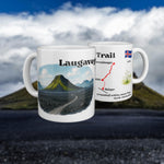 White mug with a watercolour map of the Laugavegur Trail, shown from two sides.