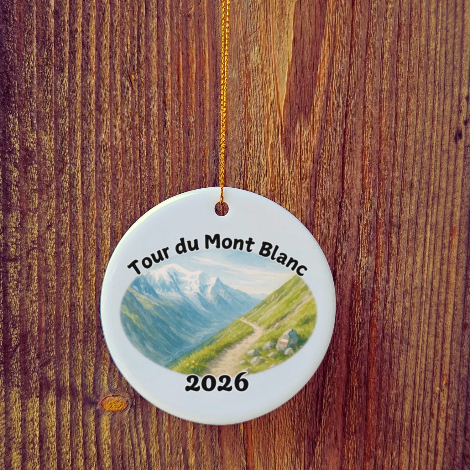 Basic version of Tour du Mont Blanc ornament in front of wooden door.