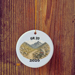 Basic version of GR 20 ornament in front of wooden door.