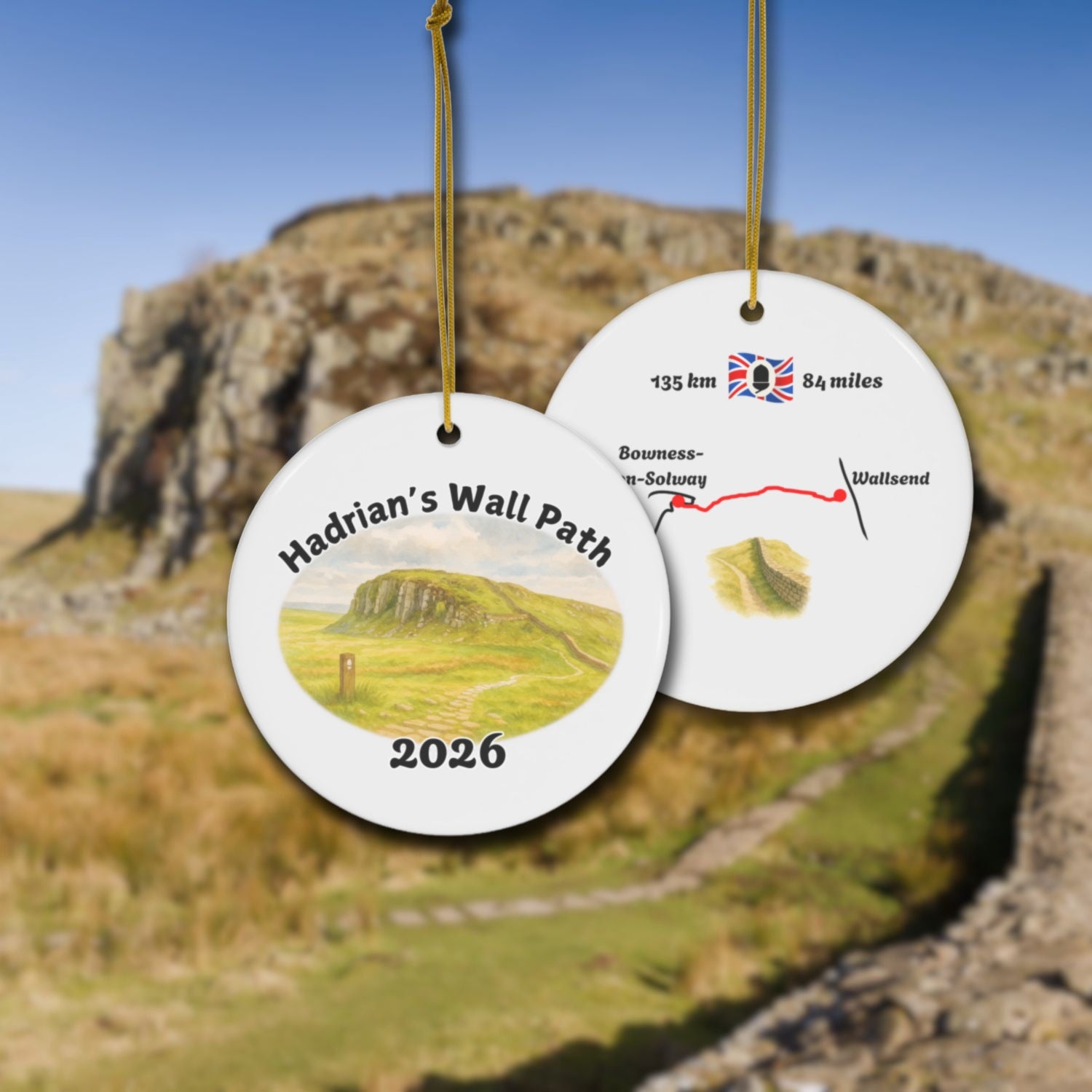 Hadrian's Wall Path ceramic ornament, RI variation, with watercolor landscape shown front and back.