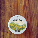 Basic version of The Dingle Way ornament in front of wooden door.