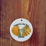 Basic version of Caminito del Rey ornament in front of wooden door.