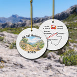 GR 221 Trockenmauerweg ceramic ornament with watercolor landscape shown front and back in front of trail landscape.