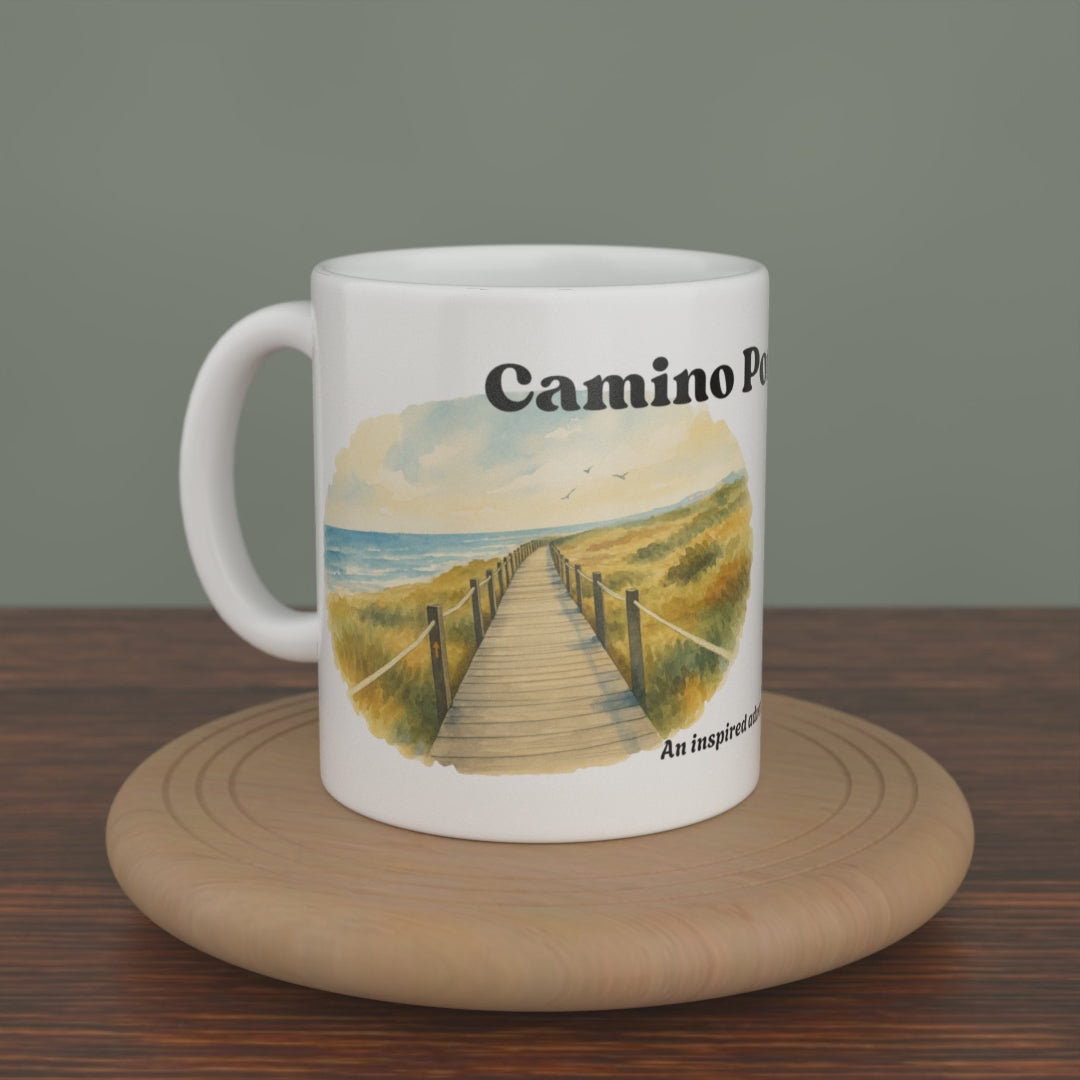 Video of a white Camino Portugues mug turning slowly, showing both editions: the watercolour map and the photo version.