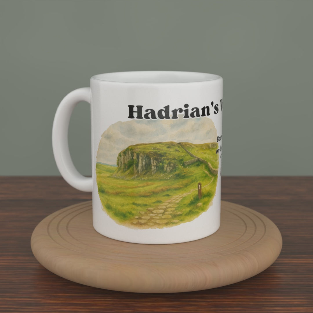 Video of a white Hadrian's Wall Path mug turning slowly, showing both editions: the watercolour map and the photo version.
